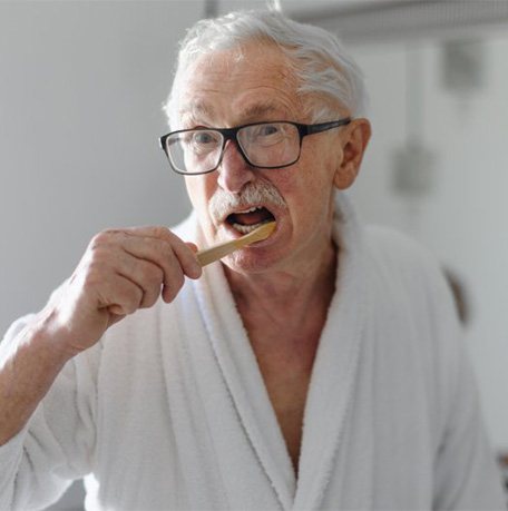 Dentures patient in Soldotna smiling