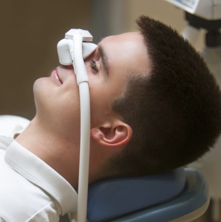 Dental patient receiving nitrous oxide dental sedation